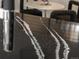 Close-up of a kitchen island showing the marble countertop, design and details at 3715 Kalamath St, Denver, CO 80211
