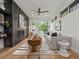 Cozy living room with modern fireplace, hardwood floors, and a comfortable seating area at 3715 Kalamath St, Denver, CO 80211