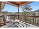 A balcony showcasing mountain views from comfortable chairs at 9659 S Turkey Creek Rd, Morrison, CO 80465