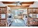 Shared bedroom featuring four log-style bunk beds, a center window for light, and a playful, shared space at 9659 S Turkey Creek Rd, Morrison, CO 80465