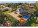 Aerial view of a stunning house featuring a pool, hot tub, and expansive wooden deck at 8090 Newton St, Westminster, CO 80031