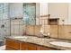 Bathroom featuring double sinks, granite countertops, and tiled shower at 8090 Newton St, Westminster, CO 80031