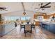 Open-concept dining area adjacent to the kitchen, featuring modern furnishings and plenty of natural light at 8090 Newton St, Westminster, CO 80031