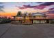 Stunning exterior of a two-story home with a spacious deck and a beautifully landscaped front yard at sunset at 8090 Newton St, Westminster, CO 80031