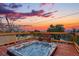Hot tub on deck with views of an orange sunset at 8090 Newton St, Westminster, CO 80031