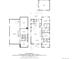Floorplan of home featuring basement, kitchen, bedrooms, bathrooms, and outdoor patio at 4711 S Logan St, Englewood, CO 80113