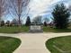 Duncan Park sign with manicured lawn, trees, and sidewalk, providing a welcoming community space at 4711 S Logan St, Englewood, CO 80113