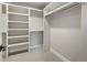 Spacious walk-in closet with custom shelving, offering ample storage and organization at 2521 N Gaylord St, Denver, CO 80205