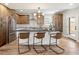 Island seating in a stylish kitchen featuring stainless appliances, modern cabinets, and open layout at 2521 N Gaylord St, Denver, CO 80205