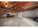 Unfinished basement with exposed ceiling, concrete floor, offering potential for customization at 18001 Herrera Dr, Parker, CO 80134