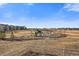 Community playground featuring a slide and shaded picnic tables in a beautifully landscaped setting at 18001 Herrera Dr, Parker, CO 80134