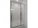 Modern bathroom with white tiled shower stall and glass door at 18001 Herrera Dr, Parker, CO 80134