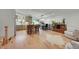 Open-concept living space featuring hardwood floors, and an elegant dining area at 6034 S Niagara Ct, Centennial, CO 80111