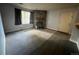 Inviting living room with stone fireplace and plush carpeting provides a cozy atmosphere at 10785 W 63Rd Pl # 105, Arvada, CO 80004