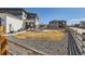 Beautiful backyard with a well-maintained lawn, patio area, and attractive landscaping, perfect for outdoor living at 10723 Sedalia St, Commerce City, CO 80022