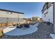 Cozy backyard patio area with comfortable seating, ideal for relaxation and outdoor entertaining at 10723 Sedalia St, Commerce City, CO 80022