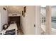 Unique hallway featuring a play area with a 'Diagon Alley' theme, creating a magical and fun space at 10723 Sedalia St, Commerce City, CO 80022