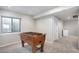 Recreational area with foosball table and bright window at 13087 Krameria St, Thornton, CO 80602