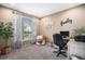 Cozy office featuring natural light, neutral color scheme, comfortable chair, and modern desk at 13087 Krameria St, Thornton, CO 80602