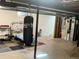 Unfinished basement featuring a punching bag and workout area at 984 S Braun Dr, Lakewood, CO 80228