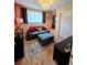 Cozy bedroom featuring a comfortable couch, ottoman, and stylish decor creating a relaxing atmosphere at 984 S Braun Dr, Lakewood, CO 80228