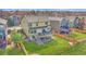 Aerial view of backyard featuring two tiered deck and spacious yard at 9767 Burberry Way, Highlands Ranch, CO 80129