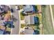 Bird's-eye view of a home with a well-maintained yard, fence, patio, and a driveway that can accommodate multiple cars at 9767 Burberry Way, Highlands Ranch, CO 80129