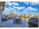 Enjoy outdoor living on the deck with views and seating area with fire pit and grill at 9767 Burberry Way, Highlands Ranch, CO 80129