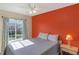 Inviting bedroom with a large window and a comfortable bed at 9767 Burberry Way, Highlands Ranch, CO 80129