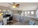 Open office space on the upper level with built-in desk, hardwood floors and natural light at 9767 Burberry Way, Highlands Ranch, CO 80129