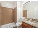Bathroom featuring a granite countertop, vanity, and tiled shower at 10663 Dexter Dr, Thornton, CO 80233