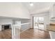 Bright living area with hardwood floors, fireplace and sliding glass doors to deck at 10663 Dexter Dr, Thornton, CO 80233