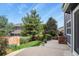 A backyard featuring a concrete patio perfect for outdoor gatherings and relaxation at 5453 S Quatar Ct, Aurora, CO 80015