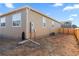 A spacious backyard featuring a wood fence, perfect for outdoor activities and privacy at 13408 Wabash St, Thornton, CO 80602