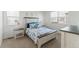 Comfortable bedroom with a large bed, natural light, and neutral decor at 13408 Wabash St, Thornton, CO 80602