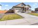 Lovely home with a spacious driveway and attractive landscaping at 13408 Wabash St, Thornton, CO 80602