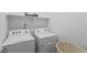 Laundry room featuring a washer and dryer at 13408 Wabash St, Thornton, CO 80602