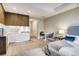 Cozy apartment with modern kitchen appliances, dining area, and bedroom with plush furnishings at 4200 W 17Th Ave # 625, Denver, CO 80204