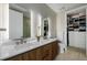 Bathroom with double sink vanity, large mirror and plenty of storage space at 4200 W 17Th Ave # 625, Denver, CO 80204