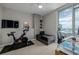 Bedroom with concrete pillar, desk, workout bicycle, and mountain views at 4200 W 17Th Ave # 625, Denver, CO 80204