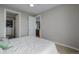 Bedroom with closet space and views into the kitchen at 4200 W 17Th Ave # 625, Denver, CO 80204