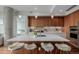 Modern kitchen island with stylish seating and contemporary finishes at 4200 W 17Th Ave # 625, Denver, CO 80204