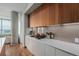 Modern kitchen featuring sleek cabinetry, stainless steel appliances and a view at 4200 W 17Th Ave # 625, Denver, CO 80204