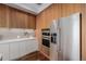 Well appointed kitchen features stainless steel appliances and wood cabinetry at 4200 W 17Th Ave # 625, Denver, CO 80204