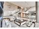Bright lobby features modern decor, a grand staircase, and comfortable seating areas with neutral palettes at 4200 W 17Th Ave # 625, Denver, CO 80204