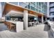 Open outdoor patio with bar area and comfortable seating arrangements, perfect for entertaining guests at 4200 W 17Th Ave # 625, Denver, CO 80204