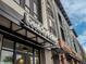 Shot of 'Boulder Baked' storefront, promising delicious bakery treats near attractive residences at 2282 Old Rail Way, Superior, CO 80027