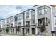 Street view of modern townhomes with balconies and contemporary design, showcasing community living at 2282 Old Rail Way, Superior, CO 80027
