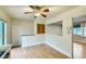 Dining room area with hardwood floors, natural light, and seamless flow into the kitchen at 11891 Gaylord Way, Northglenn, CO 80233