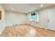 Bright living room featuring hardwood floors, a large window, neutral paint and recessed lighting at 11891 Gaylord Way, Northglenn, CO 80233